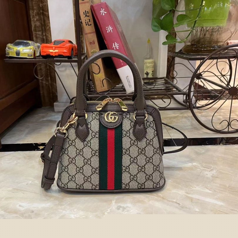 G*u*i top handle bags